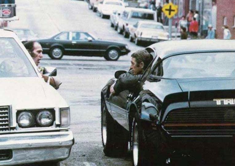 Стив МакКуин на Pontiac Trans Am 1979 года в фильме «Охотник»