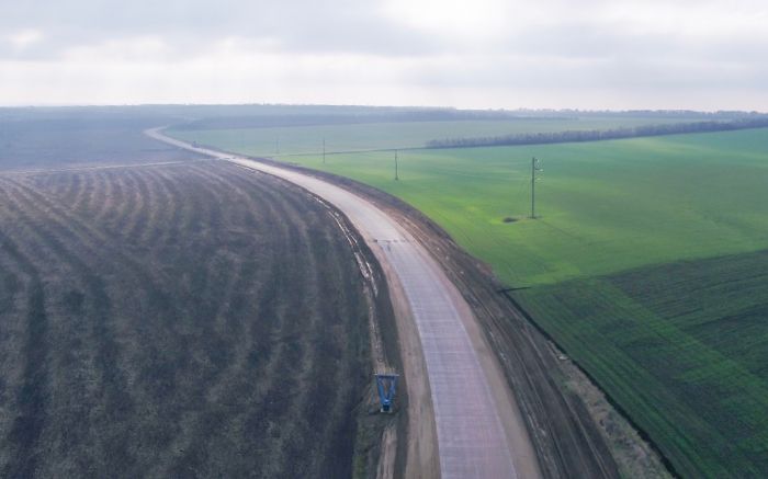 Появились новые фото строительства бетонной дороги в Николаевской области