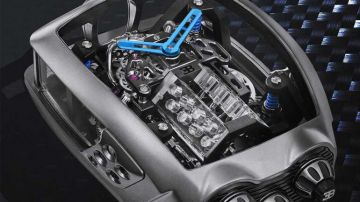 Миниатюрный двигатель Bugatti W16 поместили в часы